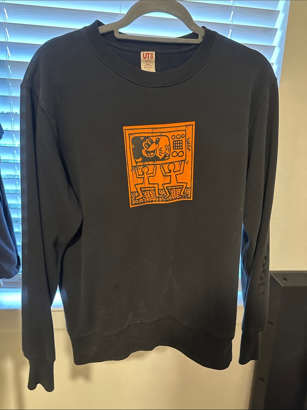 Uniqlo Keith Haring Men’s Black Crewneck Sweatshirt with Orange Graphic Panel